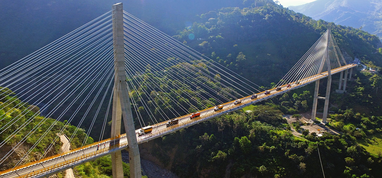 this picture shows the Hisgaura Bridge in Colombia, a cable-stayed bridge, during the final test. It is very important to monitor the strustures of the bridge during the construction and the final test to proof the safety of the structure. SHM was a key point on this project.